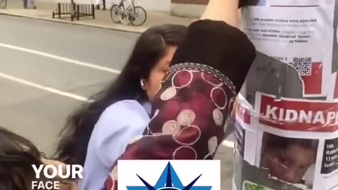 Karla Vinueza, a public relations strategist in NYC, gets caught destroying posters