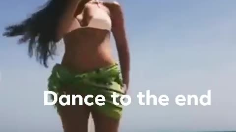 Sexy women dancing on the sea