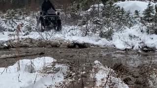Man Flies Over ATV Handlebars After Hitting Mud Hole