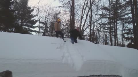Two guys cause rooftop avalanche