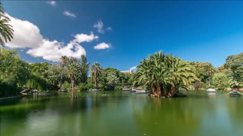 tourists in boats in parc de la ciutadella timelapse hyperlapse in barcelona spain