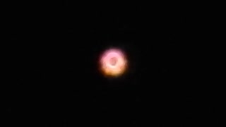 P900 Zooming in to a Colorful Flashing Star