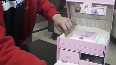 Unlocking a jewelry box using only a pin