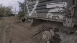 Russian armored vehicle fires on a Hummvee with Ukrainian troops inside.
