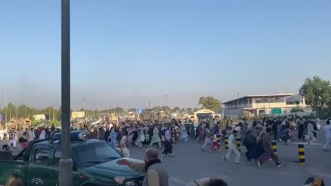 People fleeing from shots fired at the airport in Kabul/Afghanistan