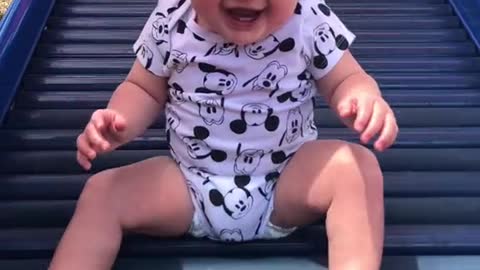 Baby girl preciously dances to 'Footloose' theme song