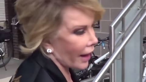 Classic Joan Rivers tells reporter Obama Is Gay, Michelle Is Transgender