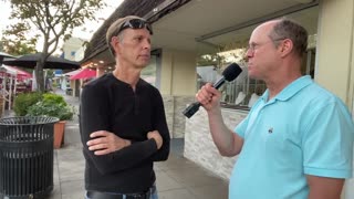 Four people on the street in downtown Los Altos talk about the CDC and v-safe