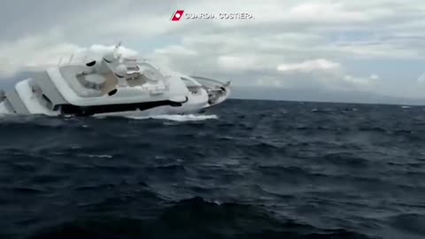 This is the dramatic moment a luxury yacht sinks off the coast of Italy