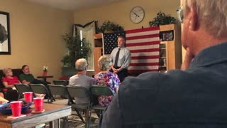 Jack Martin Congressional Candidate speaking at home meeting.