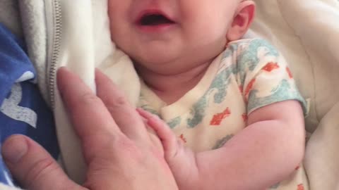 Cute baby talking to Dad