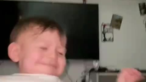 Boy Laughs At Own Blunder