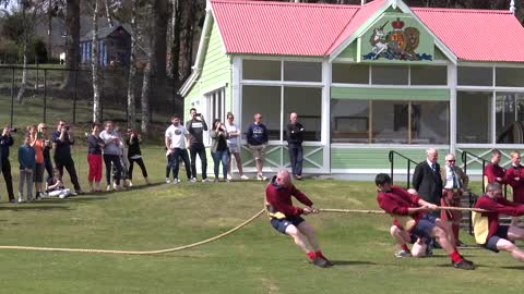 World's Strongest Men in a Tug o' War Challenge at Braemar Gathering Highland Games site in Scotland