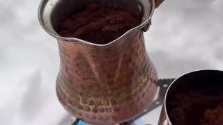 Turkish coffee from fresh snow