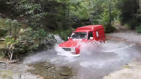 Smooth Driving Through A Deep Massive Puddle In A Renault