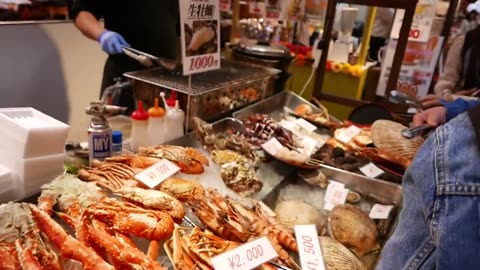 Japanese street food - Osaka Seafood clams, oysters, Japanese sea urchin