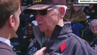Biden greeted a veteran by touching his face with his fist at the D-Day anniversary.