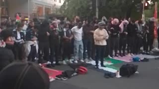 Muslims pray on the road London