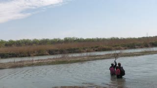 'They Keep Coming': Footage Of Migrants Crossing River Into U.S.