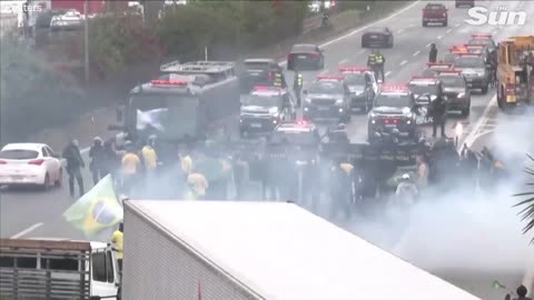 Brazilian police fire water cannons and rubber bullets at anti Lula protesters