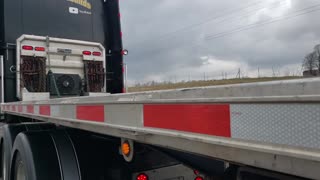 TRUCKER'S WIFE "RESCUES" HIM ON SIDE OF HIGHWAY