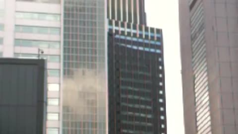 Massive earthquake at Tokyo,Japan.High-rise buildings are swaying at Shinjuku on March 11,2011