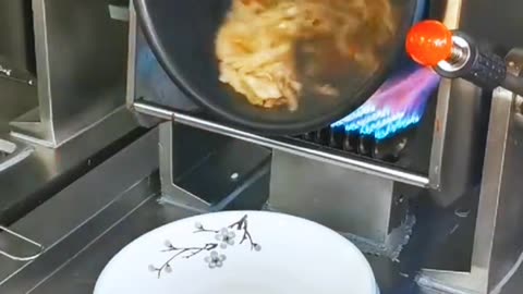 Automatic Cooking Machine in Action