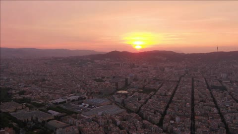 aerial spain sunset aerial video of downtown barcelona in spain during a beautiful sunset