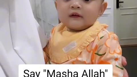 Cute baby reading quran pak