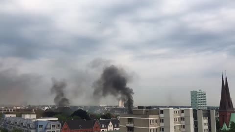 July 7 2017 Germany g20 1.4 sky is full of smoke from fires set by Antifa