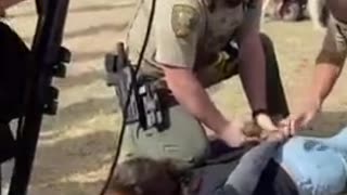 A libtard gets arrested at Trump’s rally.