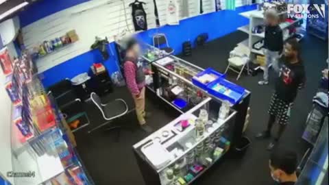 VIDEO: Gun battle breaks out between store employee and would-be robbers