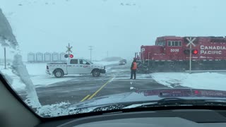 Train Pulls Stuck Truck From Snowbank