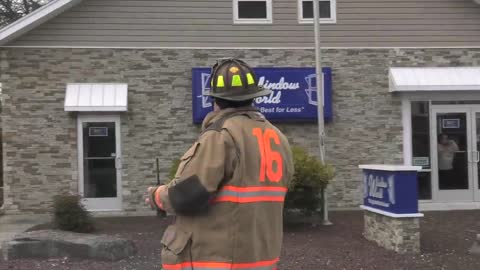 Firefighters battle fire in auto repair shop