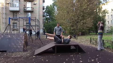 Guy Doing A Parkour Jump Lands Hard On His Back