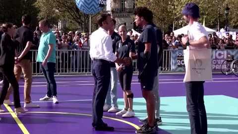 France's Macron tries wheelchair basketball