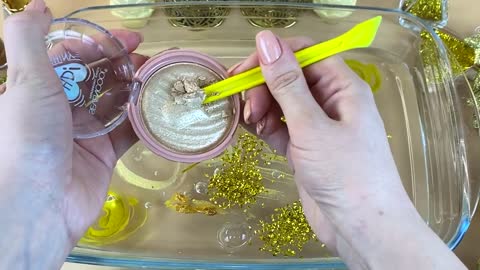 GOLD SLIME | Mixing makeup and glitter into Clear Slime | Satisfying Slime Videos