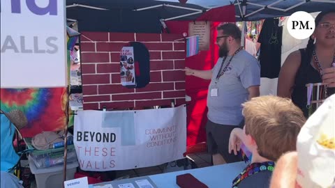 Adults at PRIDE Seattle Encourage Children to Throw Objects at Pictures of Republicans