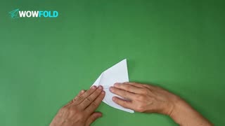 White Feather - folding a paper airplane