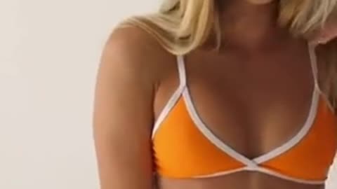 Blonde woman in Orange Bikini