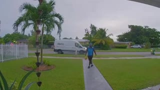 Delivery Driver Dances Down Walkway