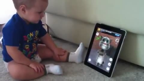 SO Funny baby talks with cat on iPad 2021