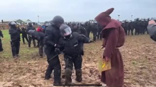 Germany: The polizei get bogged down in the field as they try to disperse protesters..