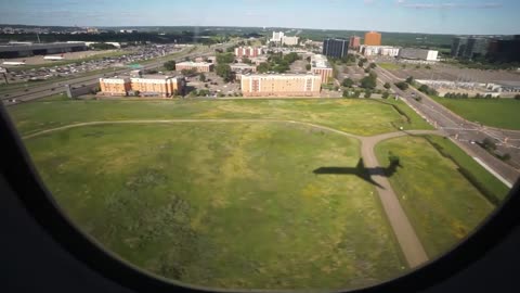 Delta MD-90 landing with our shadow at MSP