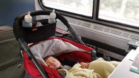 Jaxon cross country amtrak- breaking in the bassinet