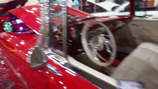 Antique cars and trucks show.