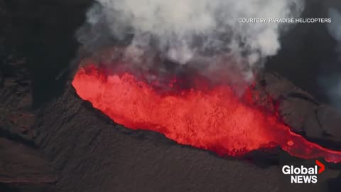 Mauna Loa volcano spews lava, gas and ash into sky as eruption continues