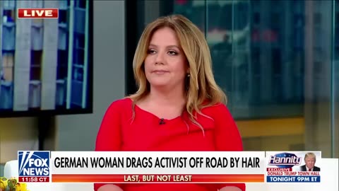 WOMEN drags climate activist off road by her hair.