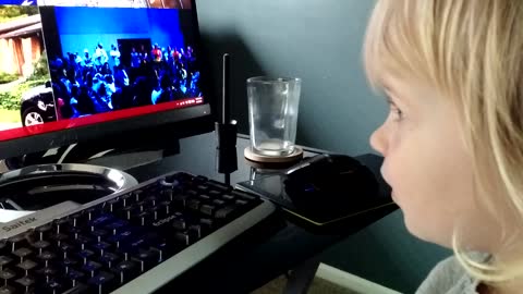 Toddler carries adorable one-sided conversation with 'Cortana'