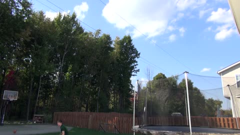 Guy Performs An Awesome Basketball Trick On A Trampoline